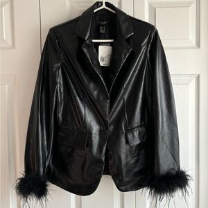Faux leather jacket feather trim